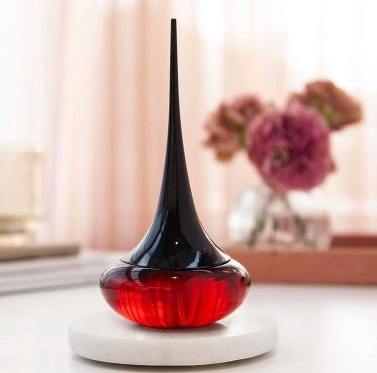 عطر زنانه ماندگار تلخ لاوپوشن اوریفلیم