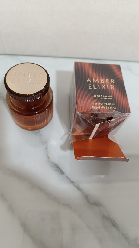 عطر ادوپرفیوم زنانه امبر الکسیر برند اوریفلیم اصل برند پرفروش